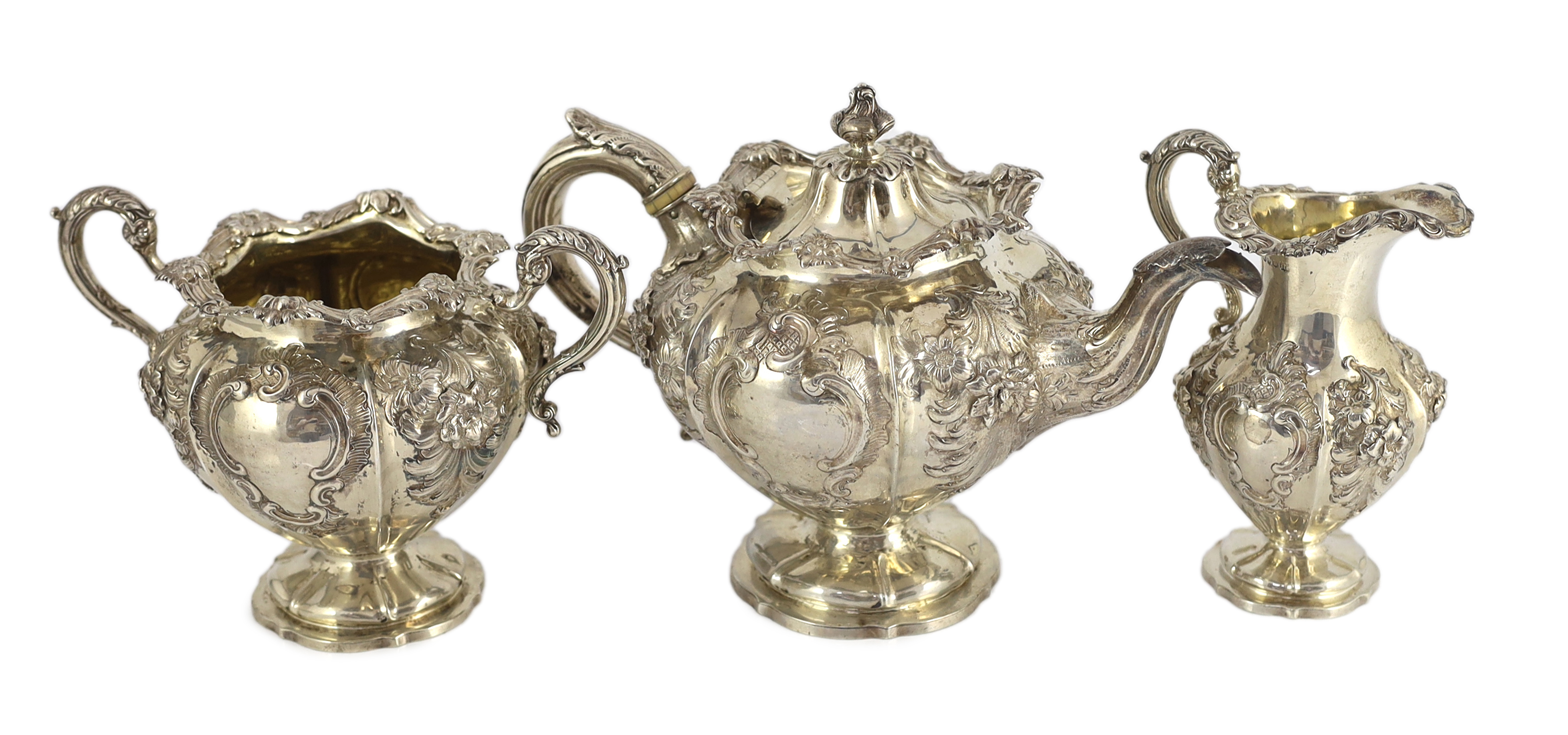 An early Victorian three piece Scottish silver inverted pear shaped tea set by Leonard Urquhart